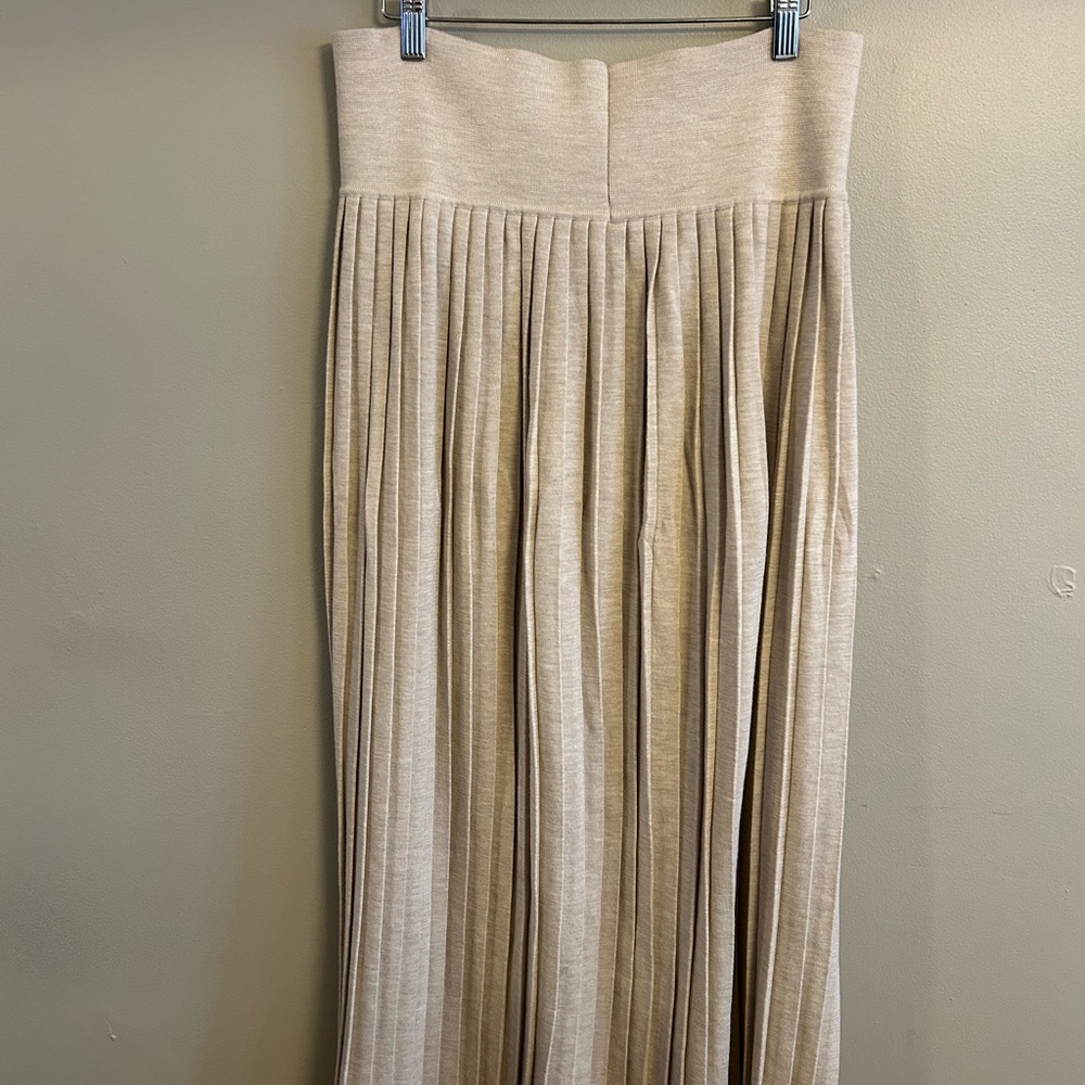 The Row Cream Maxi A-Line Pleated Skirt for anytime wear. Pristine condition